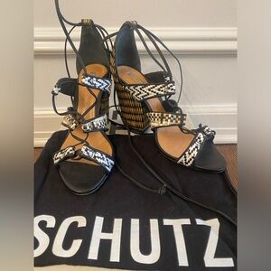 Schutz neutral block heel sandal. Tie wrap around the ankle. Size 38.